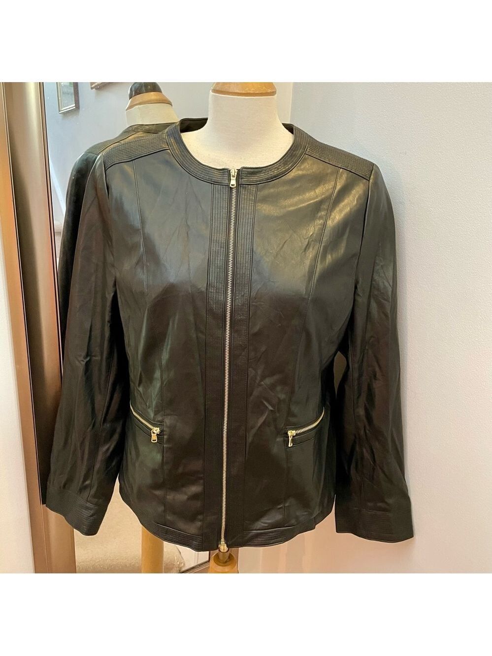 Chico’s faux leather moto jacket. Size 12 or Chico’s size 2.